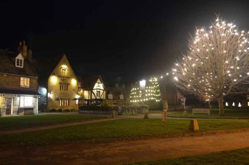 Broadway village green at night